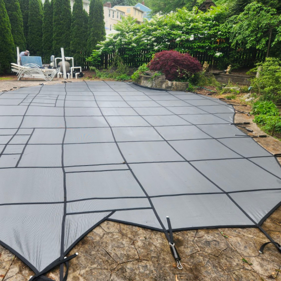 A picture of a pool safety cover